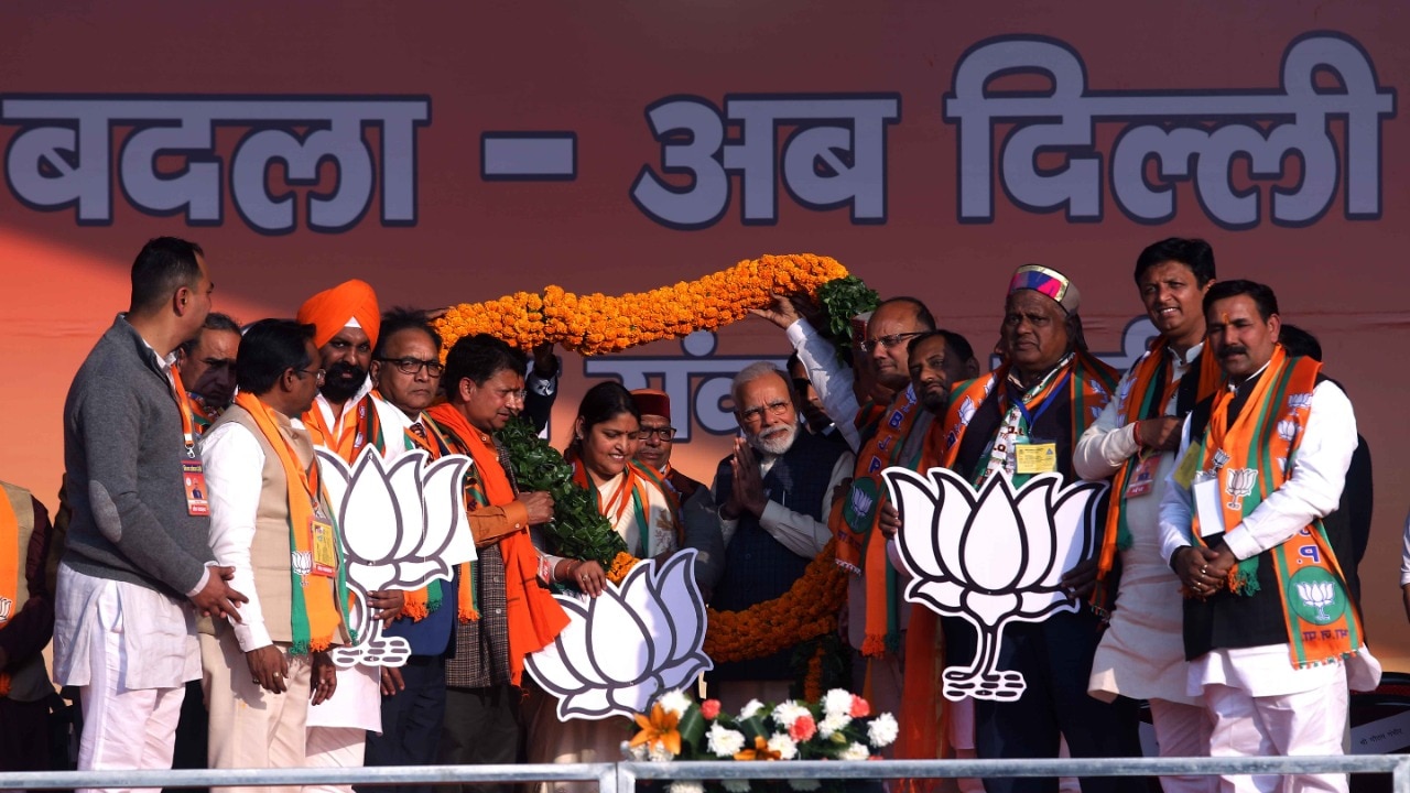 Photographs : Hon'ble Prime Minister ShriNarendra Modi addressing a public meeting at CBD Ground, Near Lila Hotel,Karkarduma, Shahdara (Delhi)