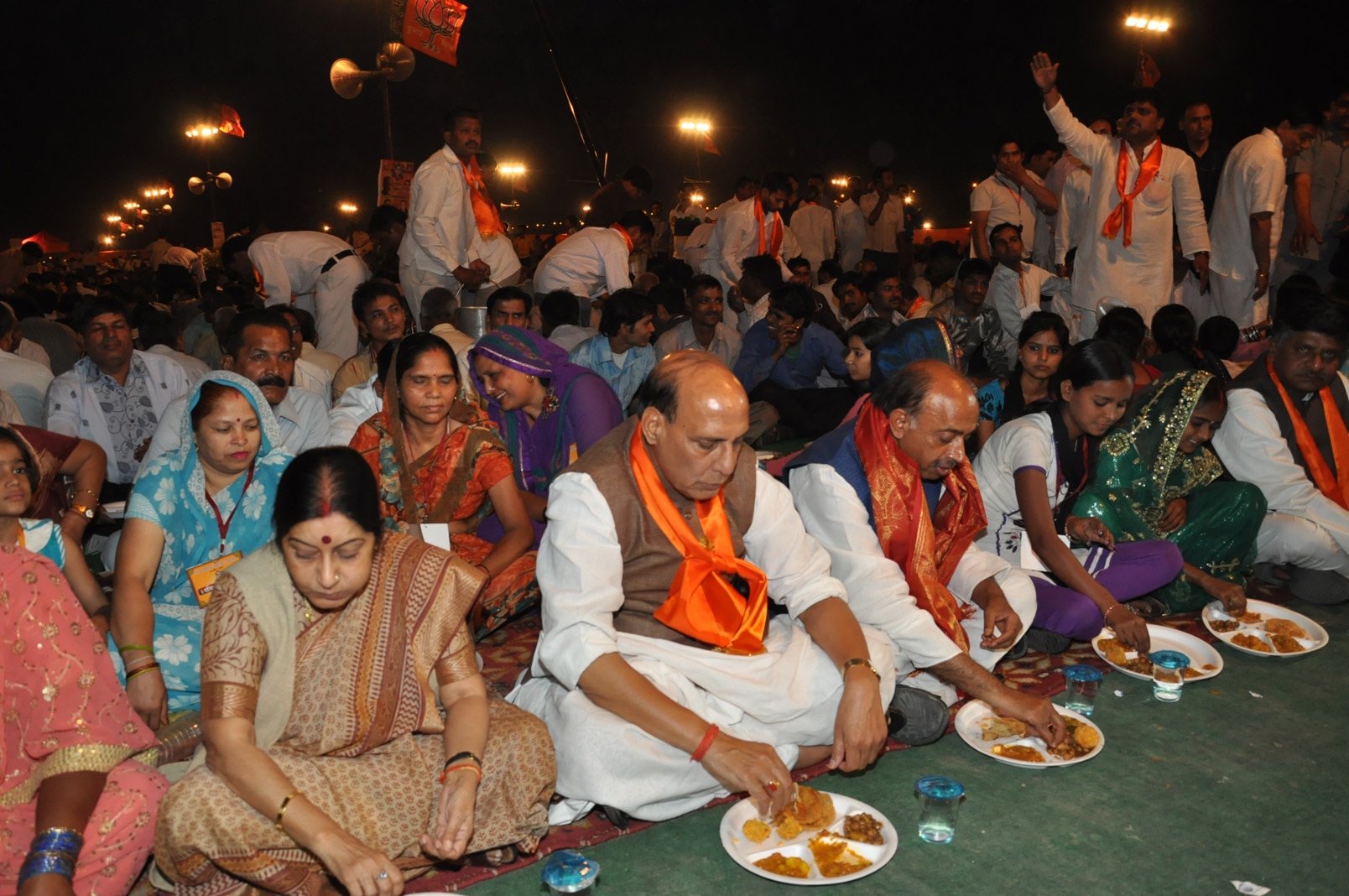 BJP National President Shri Rajnath Singh, Smt. Sushma Swaraj and Shri Vijay Goel celebrate Ambedkar Jayanti and have meal with 1000 Dalits at Burati, Delhi on April 14, 2013