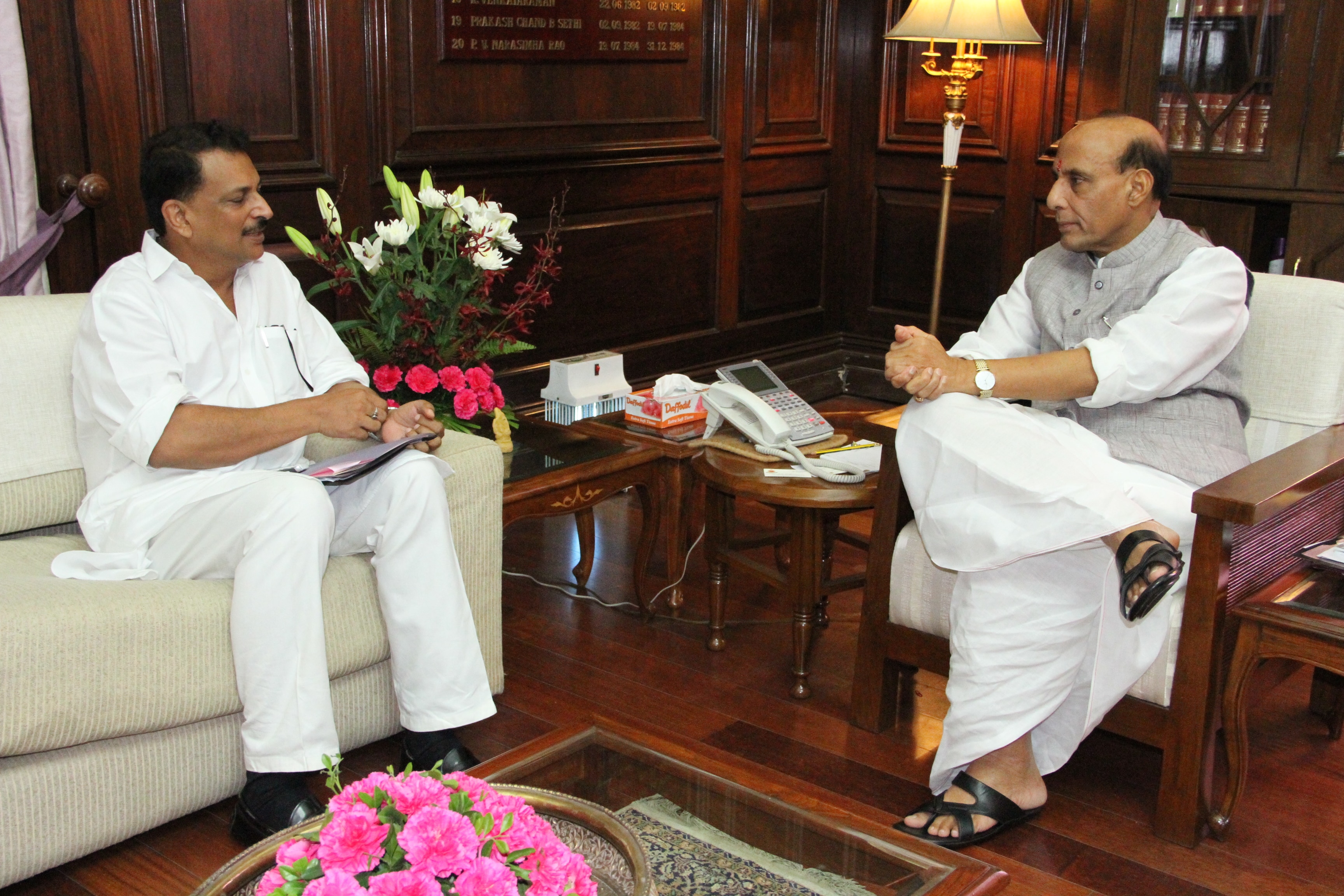 The Union Home Minister Shri Rajnath Singh meeting with the BJP MP Shri Rajiv Pratap Rudy at North Block (New Delhi) on 01 July 2014